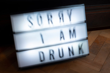 Text - Sorry I am drunk on white illuminated board. Concept for alcohol and drinking.