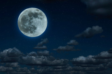 Naklejka na ściany i meble Moon and clouds in the night. Moonlight background.