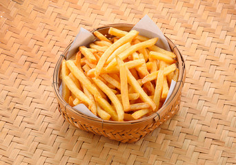 french fries on wood background