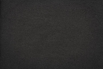 Fototapeta na wymiar texture of black knit fabric macro, textile background