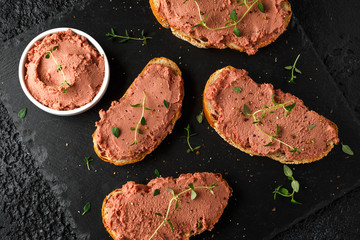 Fresh homemade chicken liver pate on bread