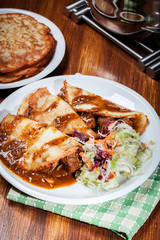 Potato pancakes with meat stew served
