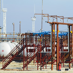 Overpass loading of oil products and fuel storage vessels