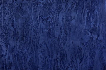 Dark blue texture of Venetian plaster. Background image.