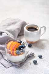Granola muesli and yogurt with fresh berries and fruit