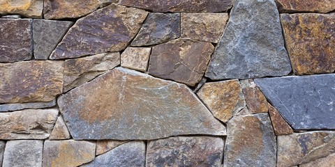 Natural background of pleated colored stonefor web, Luxurious precision stone wall - 244323484