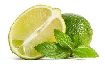 green lime and mint  with half of  juicy lime isolated on white background