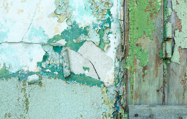 Close-up detail of cracked paint on wall.