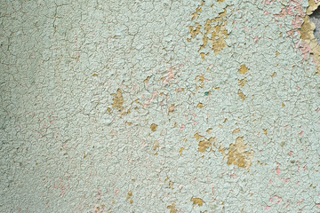 Close-up detail of cracked paint on wall.