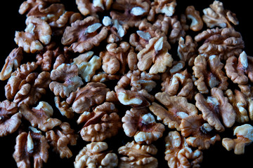 walnuts isolated on black background