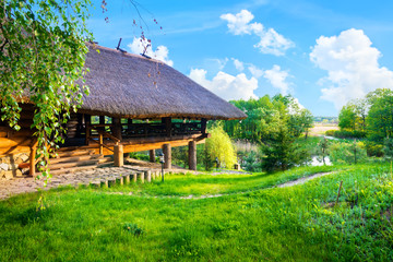 Fototapeta premium Wooden house in summer