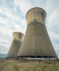 Colossal concrete cooling towers background