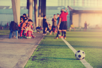 soccer ball at touchlines on artificial turf