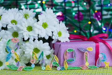 Gift and flowers for the day of March 8.