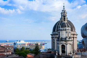 Domes of the Cathedral dedicated to Saint Agatha. The view of the city of Catania, Sicily, Italy.