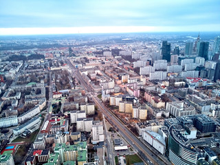 Fototapeta premium WARSAW, POLAND - NOVEMBER 21, 2018: Beautiful panoramic aerial skyline drone view to the skyscrapers located center of Warsaw City, Poland