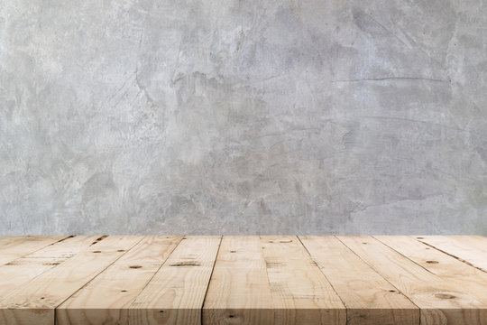 Empty wooden table and  concrete  wall texture and background with copy space, display montage for product.