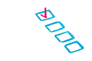 Close-up of checkbox with blue frames and red tick mark on white background