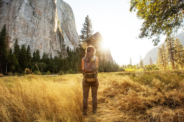 Happy hiker visit Yosemite national park in California - obrazy, fototapety, plakaty