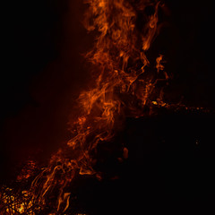 Burning of rice straw at night.