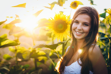 Young beautiful woman spending time in nature