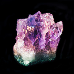 Small natural druze amethyst on black background