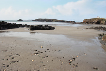 beautiful wild beach and house on the cliff at the atlantic ocean