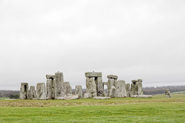 The stone monument Stonehenge a cloudy day,  built in the late Neolithic period, around 2500 BC for unknown reason
