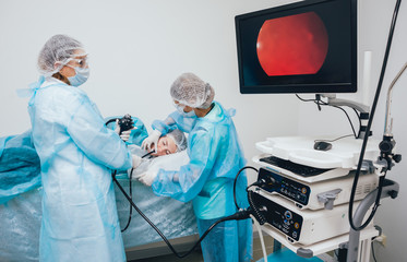 Endoscopy at the hospital. Doctor holding endoscope before gastroscopy