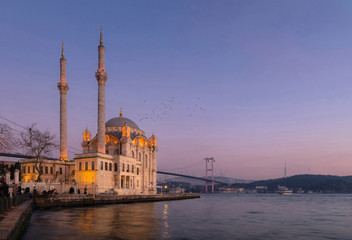 Fototapeta na wymiar Ortakoy Mosque with Bosphorus Bridge in Istanbul during the sunset.