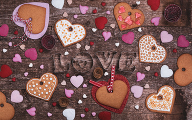 Love Valentines Day Background. Valentines Day Heart Shaped Cookies on Wooden Background. Selective focus.