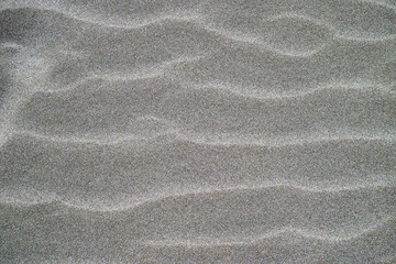 Fototapeta na wymiar Fine sand waves textured high resolution background