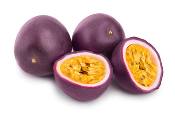 Two whole passion fruits and a half isolated on white background. Isolated maracuya