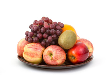 Naklejka na ściany i meble fresh fruits on a plate