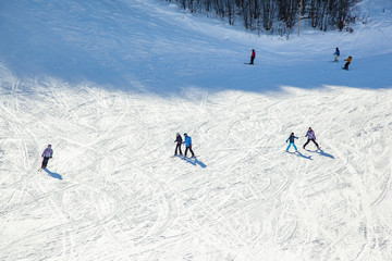 Skiers on mountain