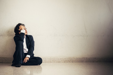 Fototapeta premium Portraits of Asian businessman stressed from work.anxiety in adult cause to depression and a problem in living that drag you down to feeling sadness,lonely and worried.