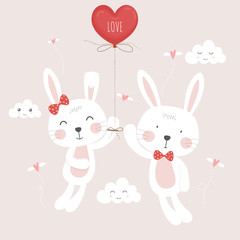 Obraz na płótnie Canvas Cute in loved rabbits with balloon.