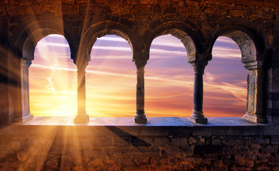 Abstract scenic scenic landscape with sunset with sunlight through medieval arches. Porto Venere, Italy. Charming places.