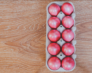 8586465 Easter scene, painted eggs in a box, top view