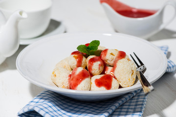 cottage cheese dessert with strawberry sauce