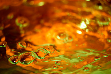 Multicolored yellow with green background with bubbles