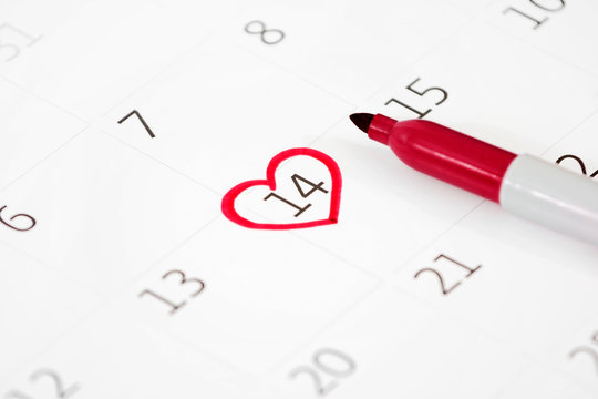 Calendar page with the red hearts on February 14 of Saint Valentines day