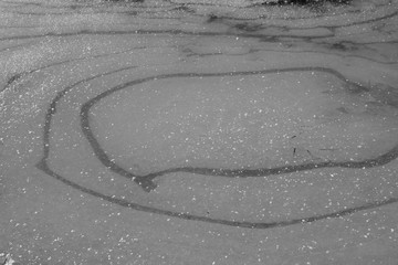Fototapeta na wymiar Ice pieces surface texture traces during winter season