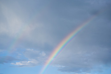 Rainbow in the blue sky,  two rainbows