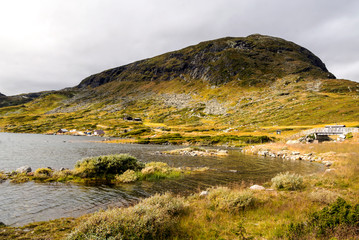 Lake in the prairies of the interior of southern Norway on a cloudy day.