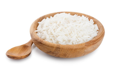 rice in a wooden bowl isolated on white background. Top view. Flat lay
