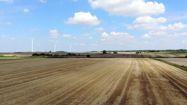 Summer. Wind power generators in the fields of Europe