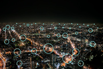 Network connection with neon light circle and Empty inside for any corporate logos or icon., in high building background at night.