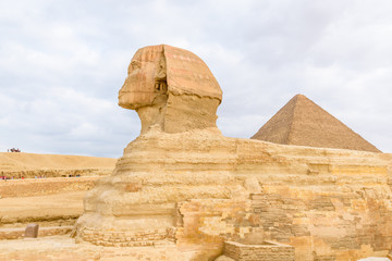 The great pyramid of Cheops and Sphinx in Giza plateau. Cairo, Egypt
