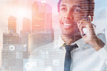 African American man with phone internet interface